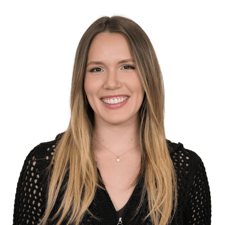 Teresa smiling confidently after veneers